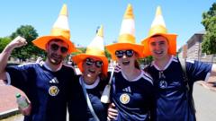 Why are Scotland fans putting traffic cones on statues in Boston?
