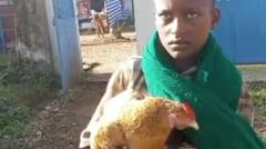 Boy, 12, wins hearts after trying to check sick chicken into Ethiopian hospital